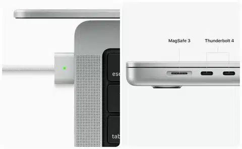 “Side angle of MacBook showing MagSafe 3 charging port with LED charging indicator”