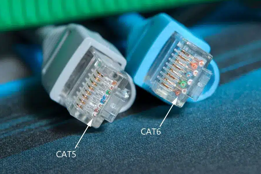 Close-up of Cat5 and Cat6 RJ45 Ethernet connectors showing pin alignment differences