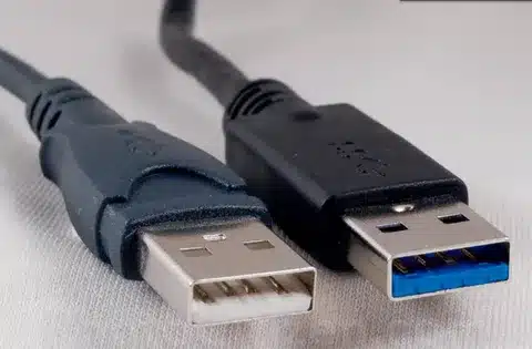 “Close-up view of USB 2.0 connector and USB 3.0 connector with blue insert.”