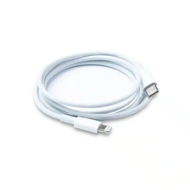 White usb c and lightning cable on plain background