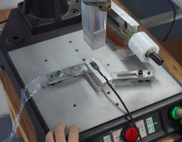 Close-up of cable testing process at Kingda Cables factory using specialized equipment