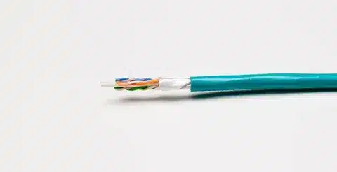 Close up of Cat6 cable showing twisted pair wires and shielding for network performance