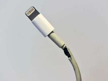 iPhone charger wire frayed near connector causing charging issues