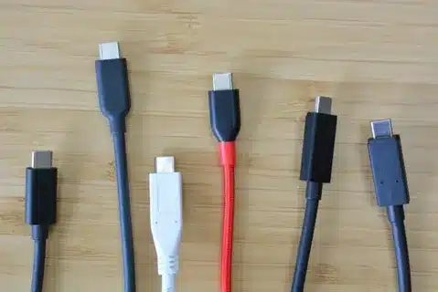 Multiple USB-C cables lined up for quality and compatibility testing