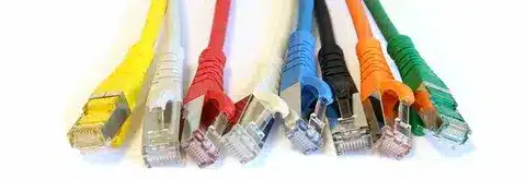 Assorted Ethernet cables in yellow, red, green, blue, black, and gray with RJ45 connectors