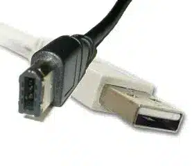 FireWire IEEE 1394 connector shown next to a USB connector for comparison