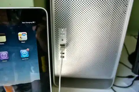 iPad Pro connected to desktop computer USB port with not charging notification