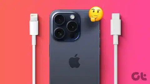 back of iPhone 15 placed between Apple Lightning connector and USB-C connector
