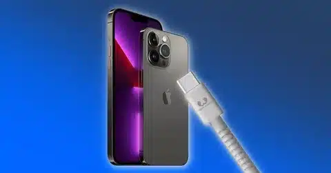iPhone 15 device displayed with USB-C charging cable beside it