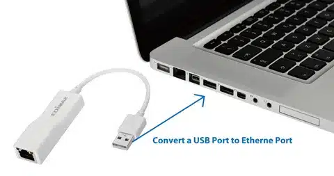 USB to Ethernet adapter plugged into laptop USB port for wired internet